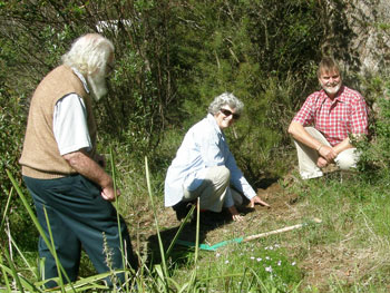 Mick Dark, Jill Dark and Lachlan planting the Waratah